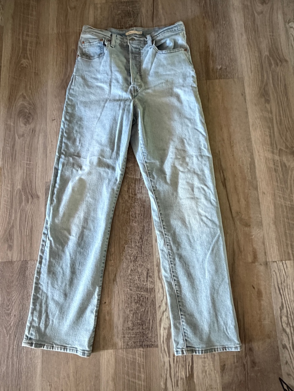 Levi's Ribcage button fly size 31, 32 length. Never worn.